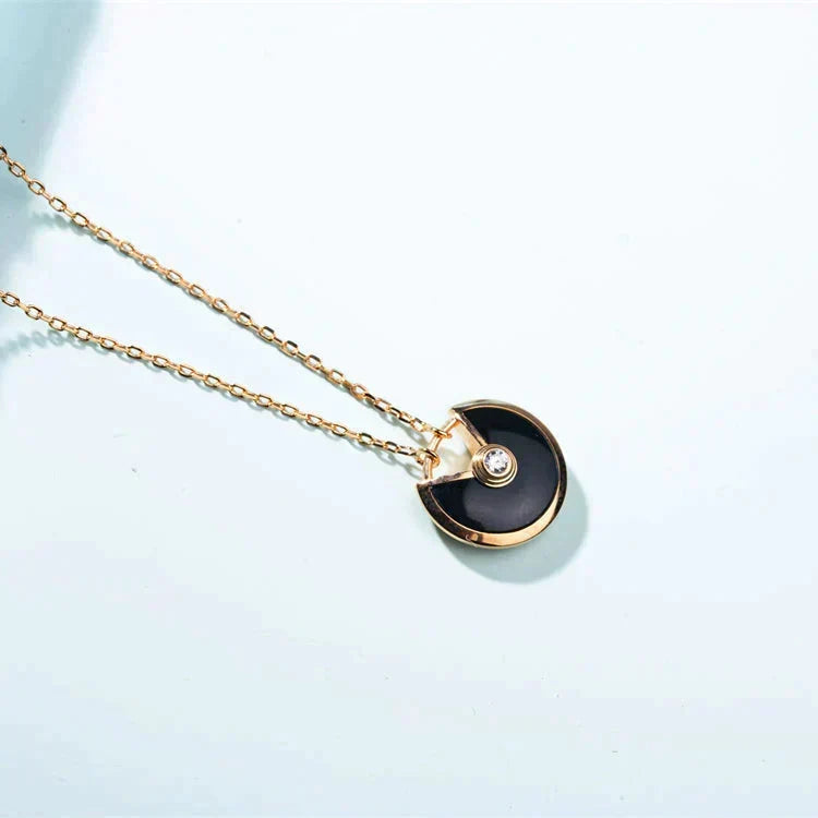 CARTIER AMULETTE GOLD CARNELIAN ONYX NECKLACE