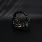 miu-miu-matelasse-leather-hobo-bag-black-with-gold-hardware Handle